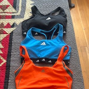3 Adidas Women's Sports Bras like new- Black, Blue, and Orange